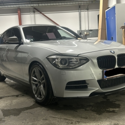 BMW M135i efter bilpleje i Horsens med flot finish og rengjort eksteriør